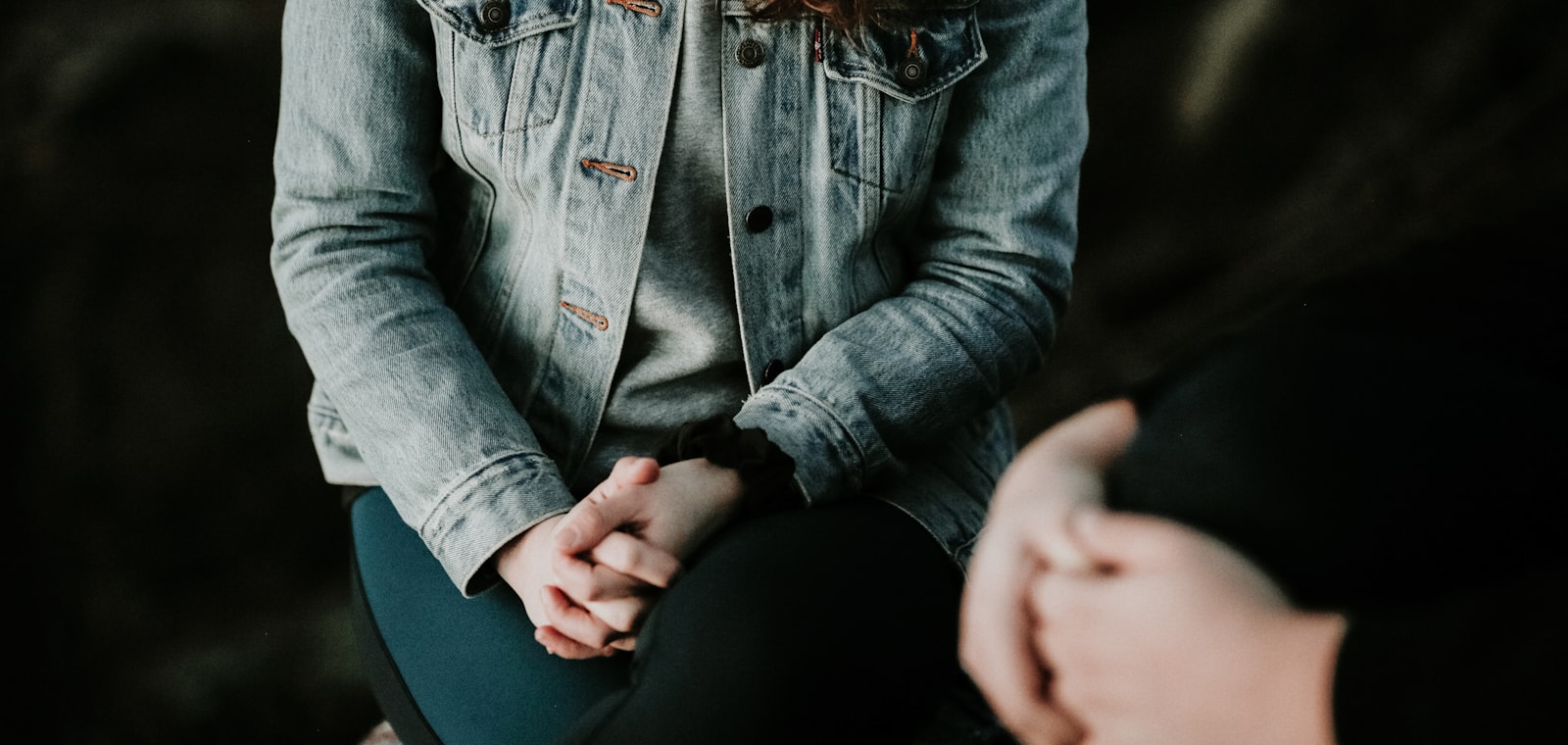 A supportive moment between two people in a care setting